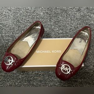 Women’s Michael Kors patent leather flats color cherry